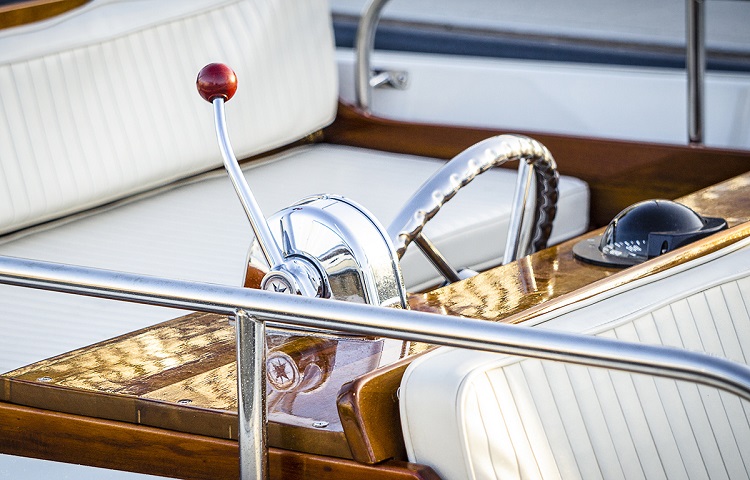 close up of a boat steering wheel 