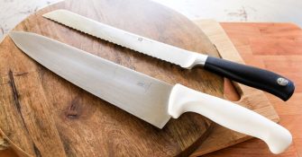 2 knives on a desk
