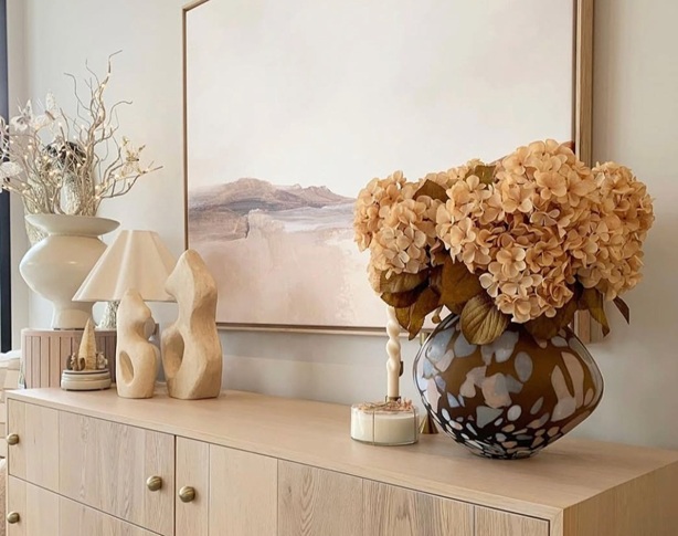 entryway with modern artwork