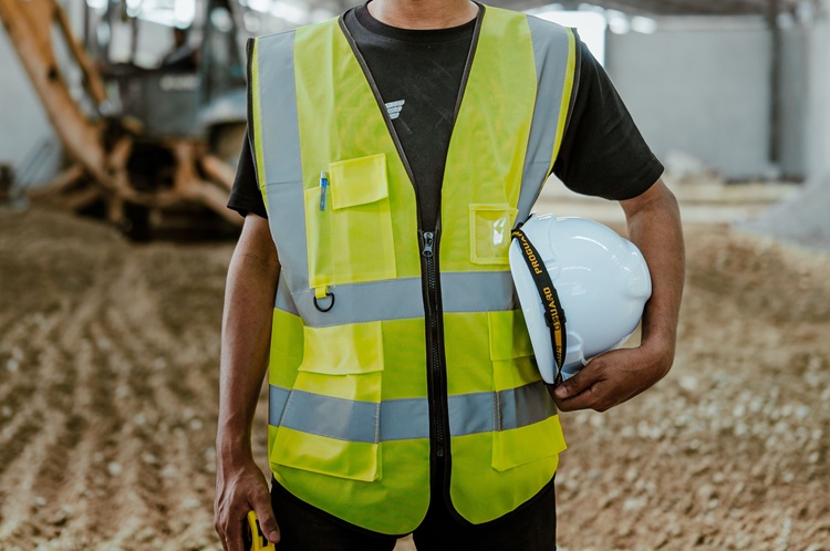 man wearing hi vis vest