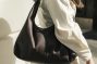 woman with a shoulder bag